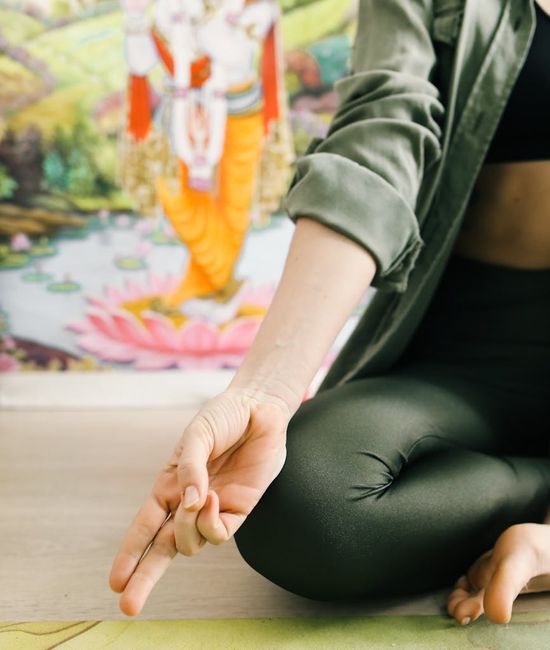 Woman in a calm, balanced yoga pose, illustrating inner peace.